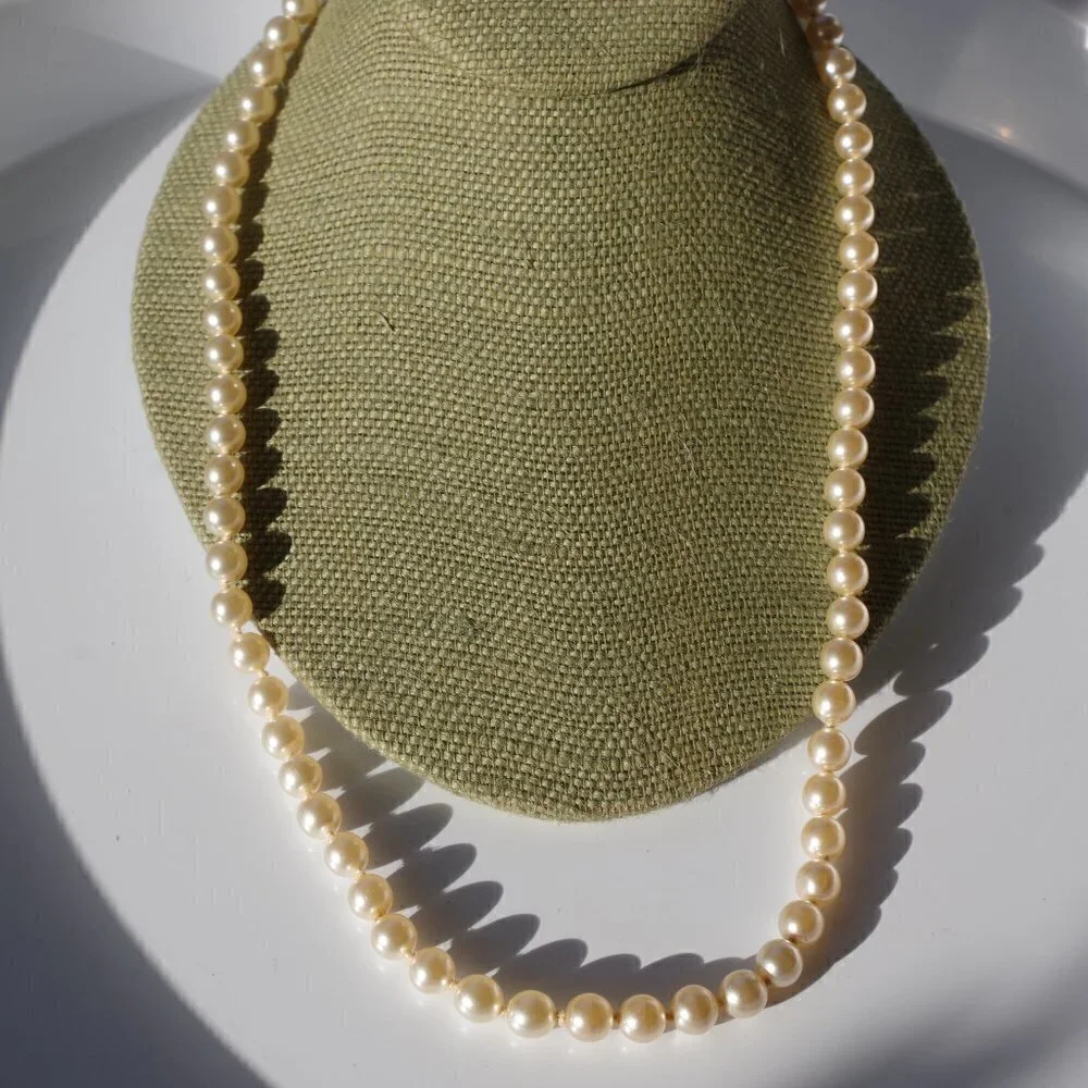Women`s white faux pearl gold tone marked g.silver